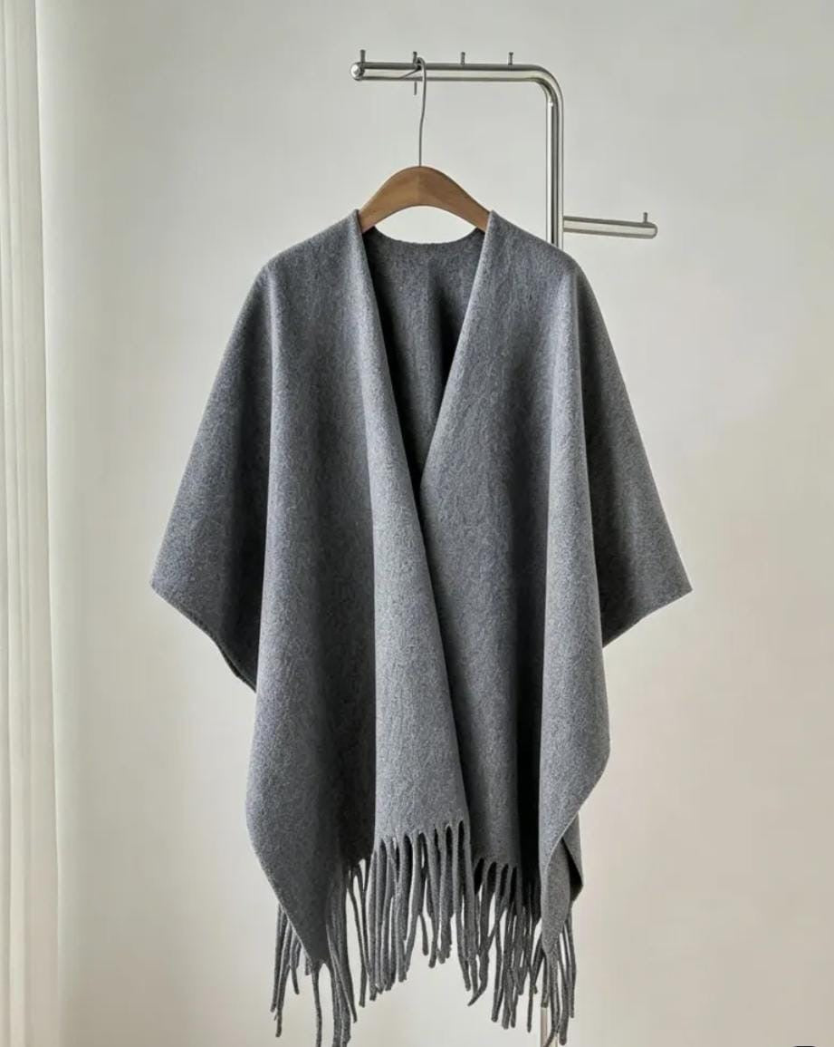 A minimalist solid-grey poncho/cape shawl