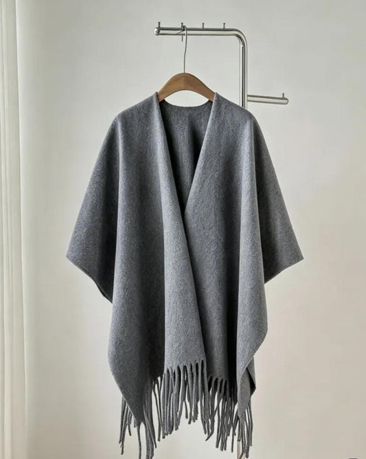 A minimalist solid-grey poncho/cape shawl