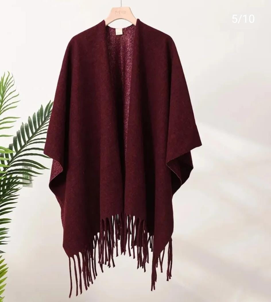 A solid burgundy/wine poncho-style shawl or cape