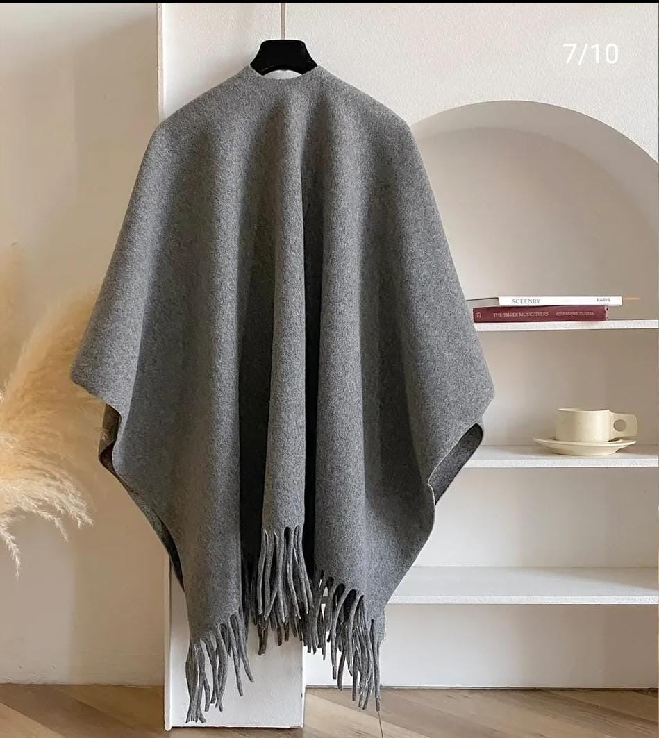 A minimalist solid-grey poncho/cape shawl