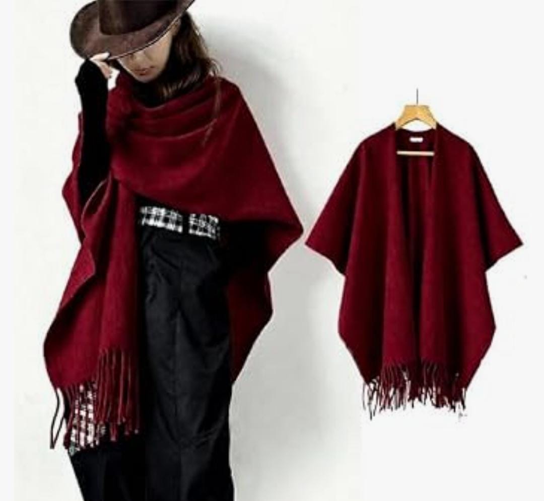 A solid burgundy/wine poncho-style shawl or cape